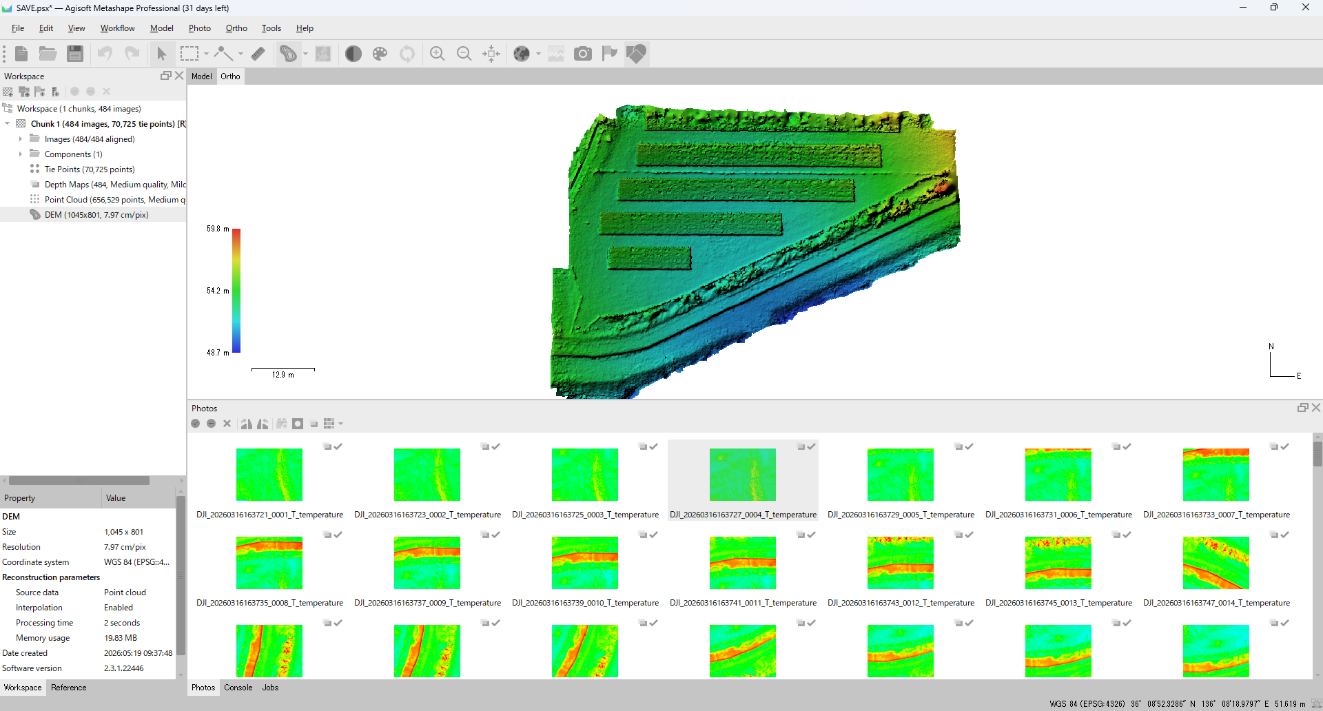 Metashape 3D view showing the generated DEM. Surface elevation is encoded by a green-to-red color ramp, with the elevation legend on the left side of the canvas